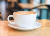hot caramel macchiato in coffee shop