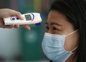 Filipinas. Entre las medidas de prevención están tomar constantemente la temperatura y usar mascarillas.