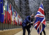 EU Council staff members remove the United Kingdom"s flag from the European Council building in Brussels on Brexit Day, January 31, 2020. Britain leaves the European Union at 2300 GMT on January 31, 2020, 43 months after the country voted in a June 2016 referendum to leave the block. The withdrawal from the union ends more than four decades of economic, political and legal integration with its closest neighbours. / AFP / POOL / OLIVIER HOSLET

 BELGIUM-BRITAIN-EU-BREXIT