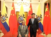 El presidente Lenín Moreno junto a su par de China, Xi Jinping, durante su visita a finales de 2018.