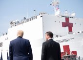 US Defense Secretary Mark Esper (R) and US President Donald Trump watch as the hospital ship USNS Comfort departs Naval Base Norfolk on March 28, 2020, in Norfolk, Virginia. The Comfort sails to New York City to aid in the coronavirus outbreak. / AFP / JIM WATSON

 US-HEALTH-VIRUS-NAVY-HOSPITAL-TRUMP