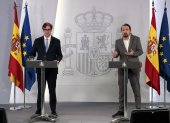 A handout picture released by the Moncloa Palace shows Spanish Health Minister Salvador Illa and Spanish Deputy Prime Minister for Social Rights and Sustainable Development Pablo Iglesias (R) holding a press conference in Madrid on April 23, 2020 amid a national lockdown to fight the spread of the novel coronavirus. - Spain said 440 people died in the past 24 hours from the new coronavirus, a slight increase for the third day running, bringing the overall death toll to 22,157. (Photo by Jose Maria Cuadrado Jimenez / LA MONCLOA / AFP) / RESTRICTED TO EDITORIAL USE - MANDATORY CREDIT "AFP PHOTO / LA MONCLOA / JOSE MARIA CUADRADO JIMENEZ" - NO MARKETING - NO ADVERTISING CAMPAIGNS - DISTRIBUTED AS A SERVICE TO CLIENTS