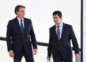 Fotos de archivo del presidente Jair Bolsonaro y el exministro de Justicia, Sergio Moro (D).