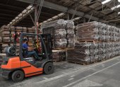 An employee works in the manufacturing of coffins at the Bignotto Funerary Urns Factory, in Cordeiropolis, Sao Paulo state, Brazil, on May 19, 2020, amid the new coronavirus pandemic. - Brazil has seen a record number of coronavirus deaths as the pandemic that has swept across the world begins to hit Latin America with its full force. (Photo by NELSON ALMEIDA / AFP)