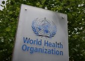 (FILES) In this file photo taken on May 12, 2020 shows a sign of the World Health Organization (WHO) in Geneva next to their headquarters, amid the COVID-19 outbreak, caused by the novel coronavirus. - President Donald Trump said May 29, 2020, he was breaking off US ties with the World Health Organization, which he says failed to do enough to combat the initial spread of the novel coronavirus. (Photo by Fabrice COFFRINI / AFP)