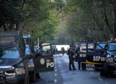 Police officers secure the area after Mexico City"s Public Security Secretary Omar Garcia Harfuch was wounded in an attacked in Mexico City, on June 26, 2020.  / AFP / PEDRO PARDO

 MEXICO-SECURITY-ATTACK