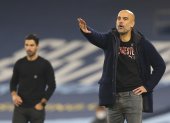 Los entrenadores, Mikel Arteta (i) y Pep Guardiola (d), trabajaron juntos en el Manchester City.