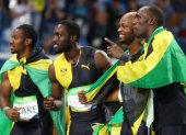 Equipo. Blake (i) consiguió oro en relevos 4x100 junto a Usain Bolt (d) en Río 2016.