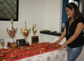 Katiuska Gómez tiene un rincón en su casa donde conserva sus copas, medallas y galardones.