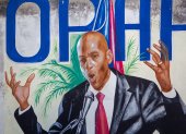 Fotografía de un mural del asesinado presidente Jovenel Moise hoy, en Puerto Príncipe (Haití).