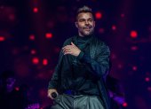 Fotografía de archivo fechada el 22 de octubre de 2021 que muestra al cantante puertorriqueño Ricky Martin mientras canta durante su concierto de la gira "Enrique & Ricky Live!" en el FTX Arena en Miami, Florida (EE.UU.).