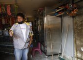 Afectado. Leonardo Guerrón perdió las herramientas de su taller automotor y su esposa parte de los productos de su local de abastos.
