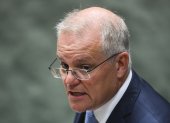 El primer ministro australiano, Scott Morrison, pidió ayer perdón a las víctimas y ofreció transparentar lo sucedido hace tres años. LUKAS COCH / EFE