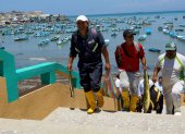 Labores. Un grupo de pescadores retorna luego de sus largas jornadas.