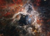 La nebulosa de Tarántula, una "guardería" de estrellas en la Gran Nube de Magallanes captada por el telescopio espacial James Webb.