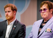 El príncipe Harry y Elton John.