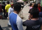 Guayaquil. El cuerpo quedó a unos metros del puesto del encebollado.