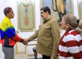 La deportista venezolana en su visita oficial con Maduro.