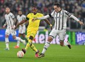 Juventus" Federico Chiesa (R) and Nantes" Samuel Moutoussamy in action during the UEFA Europa League play-off, first leg soccer match between Juventus FC and FC Nantes at the Allianz Stadium in Turin, Italy, 16 February 2023. (Italia) EFE/EPA/Alessandro Di Marco