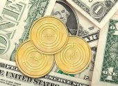 Representación.- La criptomoneda USDC cuesta menos que un dólar.