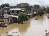 Referencial. Calles y casas inundadas.