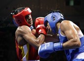 Carlos Góngora (i) ya fue a los Juegos Olímpicos de Beijing 2008 (foto) y fue campeón mundial por la Organización Mundial de Boxeo en 2020, pero no se habría sometido a los selectivos regulares.