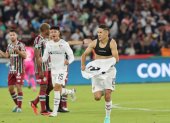 El festejo del delantero paraguayo Alex Arce tras marcar el gol del triunfo de Liga de Quito.
