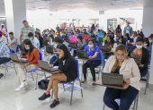 Estudiantes de la Universidad Estatal de Milagro (Unemi) durante una clase presencial.