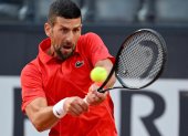 Rome (Italy), 10/05/2024.- Novak Djokovic of Serbia in action against Corentin Moutet of France (not pictured) during their men"s singles match at the Italian Open tennis tournament in Rome, Italy, 10 May 2024. (Tenis, Francia, Italia, Roma) EFE/EPA/ETTORE FERRARI