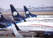 Naves. Un grupo de aviones de la aerolínea Aeroméxico en un aeropuerto.