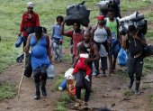Migrantes haitianos en su camino hacia Panamá por el Tapón del Darién en Acandi (Colombia).