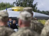 Undisclosed (Ukraine), 04/08/2024.- A handout picture made available by the Presidential Press Service shows Ukrainian President Volodymyr Zelensky speaking to servicemen next to an American single-engine supersonic multirole fighter F-16 jet during a ceremony to mark Air Force Day of the Armed Forces of Ukraine at an undisclosed location in Ukraine, 04 August 2024, amid the Russian invasion. Zelensky emphasized that the number of F-16 aircraft and trained pilots is still insufficient, as the country waits for additional fighters from partner countries. (Zelenski, Rusia, Ucrania) EFE/EPA/PRESIDENTIAL PRESS SERVICE HANDOUT HANDOUT EDITORIAL USE ONLY/NO SALES