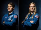 Fotografía cedida por la NASA donde aparecen las astronautas Anne McClain (i) y Nichole Ayers (d), quienes comenzaron este jueves una caminata espacial de más de seis horas para realizar mejoras de comunicaciones y abastecimiento eléctrico en la Estación Espacial Internacional