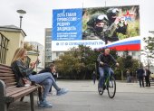 Una gran pantalla que anuncia el servicio militar obligatorio en Moscú, Rusia, 21 de septiembre de 2023.