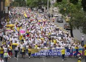 Simpatizantes del expresidente Álvaro Uribe participan en una marcha este jueves 7 de agosto de 2025, en Cali (Colombia).