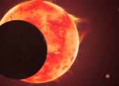 Sistema. Representación artística del planeta TRAPPIST-1 d pasando por delante de su estrella.