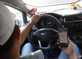 Un conductor que trabaja realizando carreras mediante la plataforma Uber.