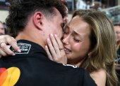 Lando Norris y Magui Corceiro tras el triunfo en Abu Dhabi.