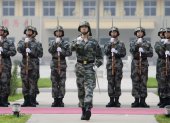 Soldados del Ejército de Liberación del Pueblo (PLA) en el centro de entrenamiento para la Tercera División de Guardia, ubicado en las afueras de Pekín (China).