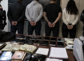 Referencia. Cuatro ciudadanos extranjeros fueron aprehendidos en Carcelén Bajo, durante un operativo policial que investigó presuntos préstamos extorsivos.