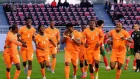 Jugadores de Costa de Marfil celebran en la cancha. La selección africana jugará el Mundial sin el apoyo de su hinchada oficial por la falta de visados de EE. UU.