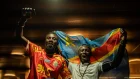 Aficionados congoleños al fútbol se reúnen para ver la transmisión del partido Portugal vs República Democrática del Congo en una Fan Zone.