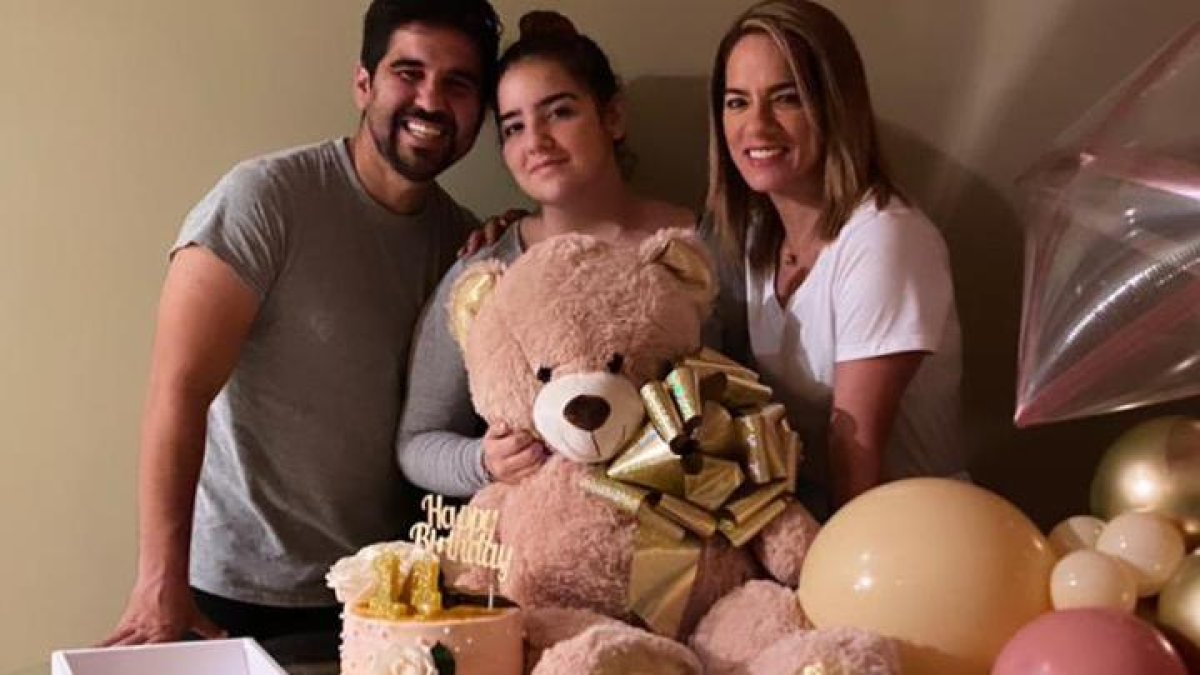 Gabriela Pazmiño con su esposo e hija, María Gabriela.