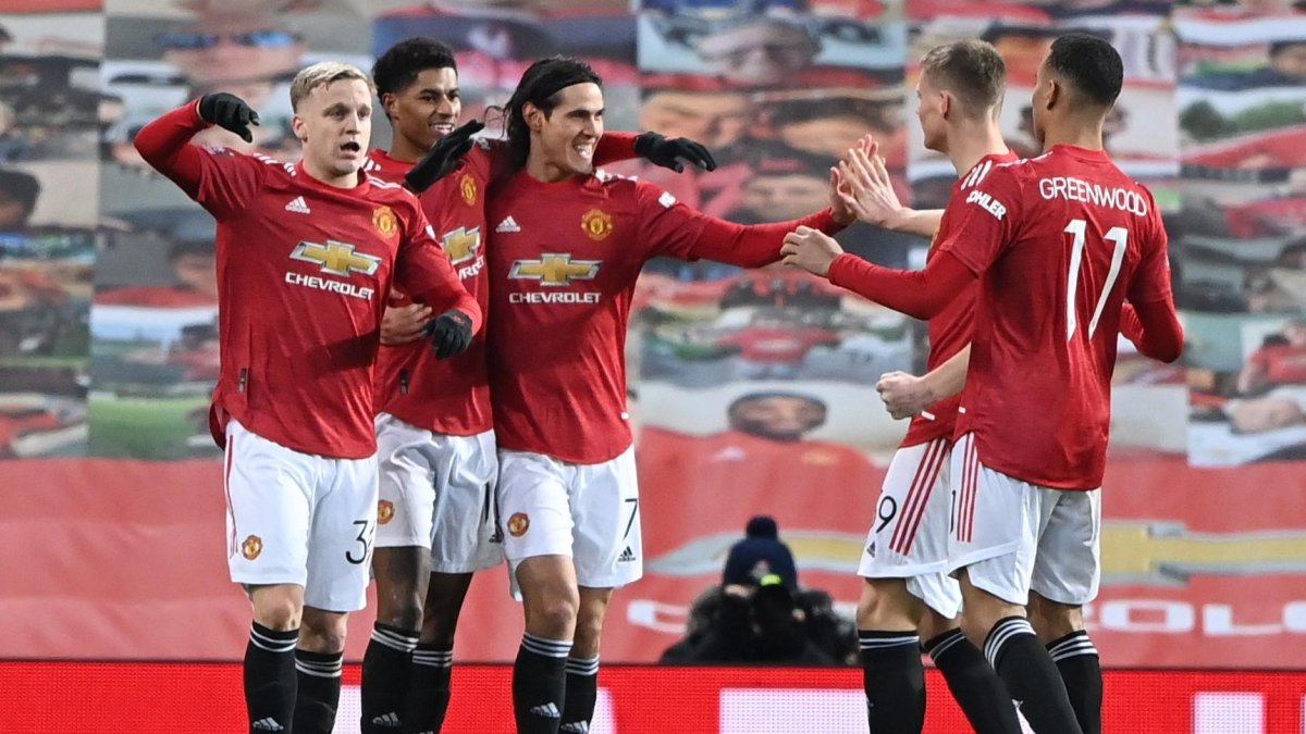 Los jugadores del Manchester United disfrutan la victoria ante el Liverpool.