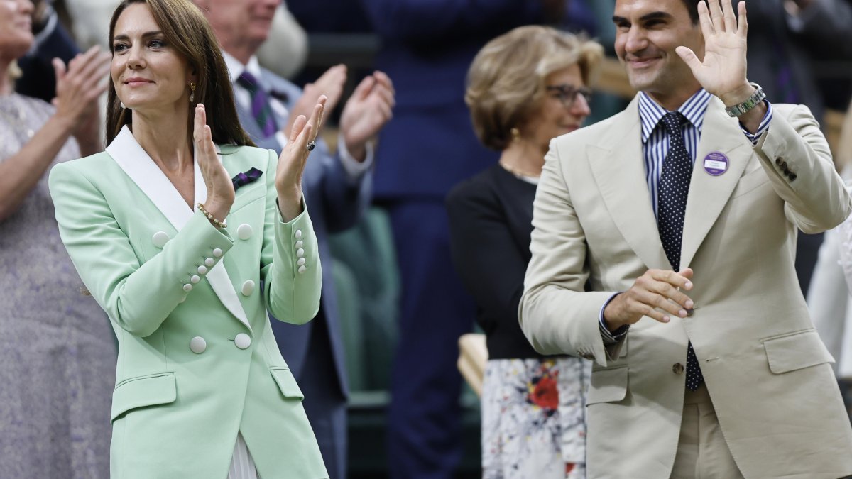 Roger junto a la princesa de Gales.