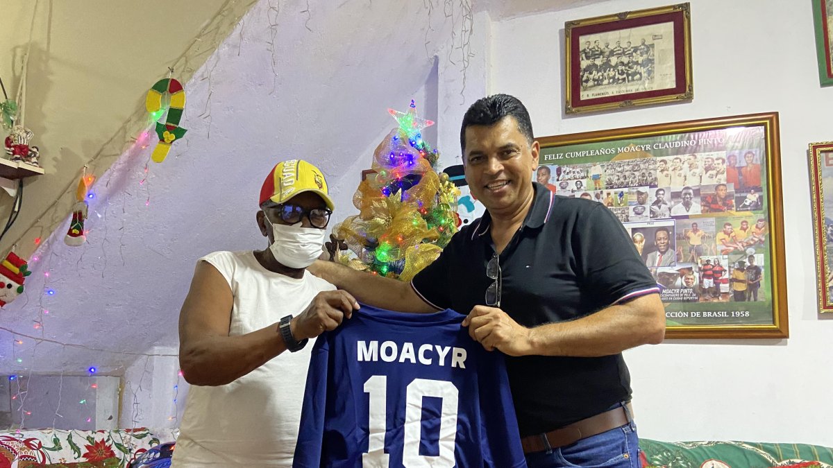 Moacyr Pinto de 89 años junto a Merlin Villagómez, que fue su dirigido en Filancard, 37 años después se volvieron a ver.