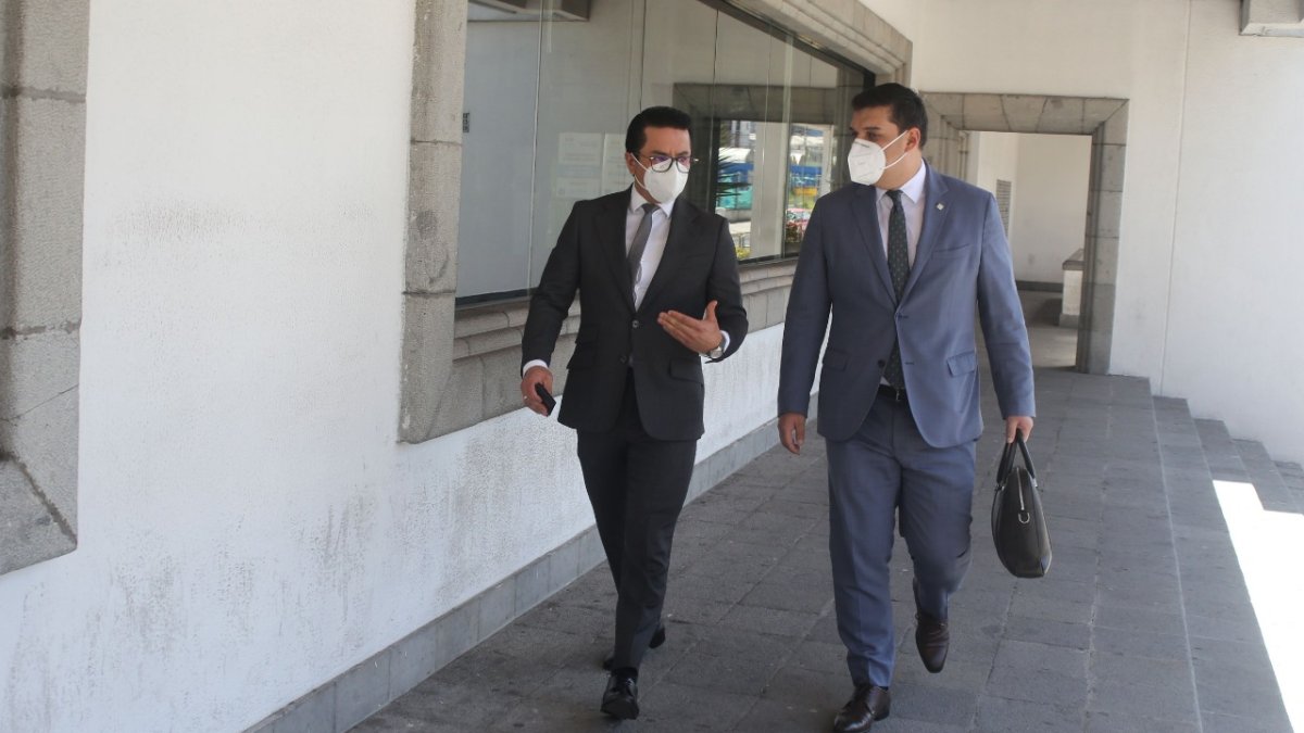 Defensa. Edwin Romero y Erick Huilca asistieron a la audiencia de apelación de siete procesados en el caso.