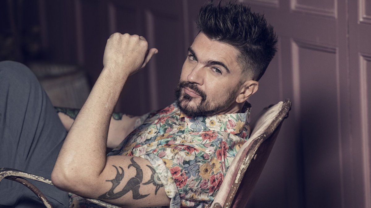 Juanes empezó en el mundo del rock a medios de los 90.