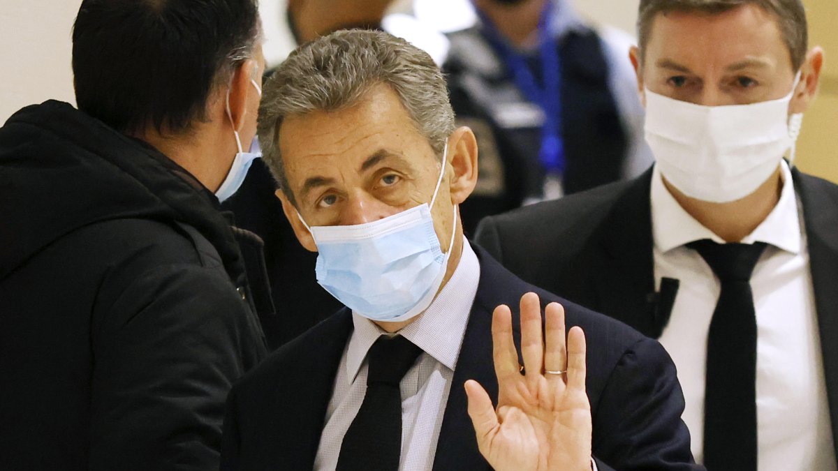 Former French president Nicolas Sarkozy (C) arrives at the court for his trial on corruption charges in the so-called 'wiretapping affair' in Paris, France, 10 December 2020 (reissued 01 March 2021).