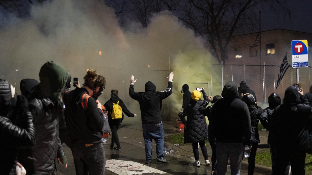 Protesters gather outside outside the Brooklyn Center Police Department, in response to a fatal officer involved shooting; in Brooklyn Center, Minnesota, USA, 12 April 2021. A Brooklyn Center police officer identified as Kim Potter fatally shot 20-year-old Daunte Wright during a traffic stop on the afternoon of 11 April 2021.